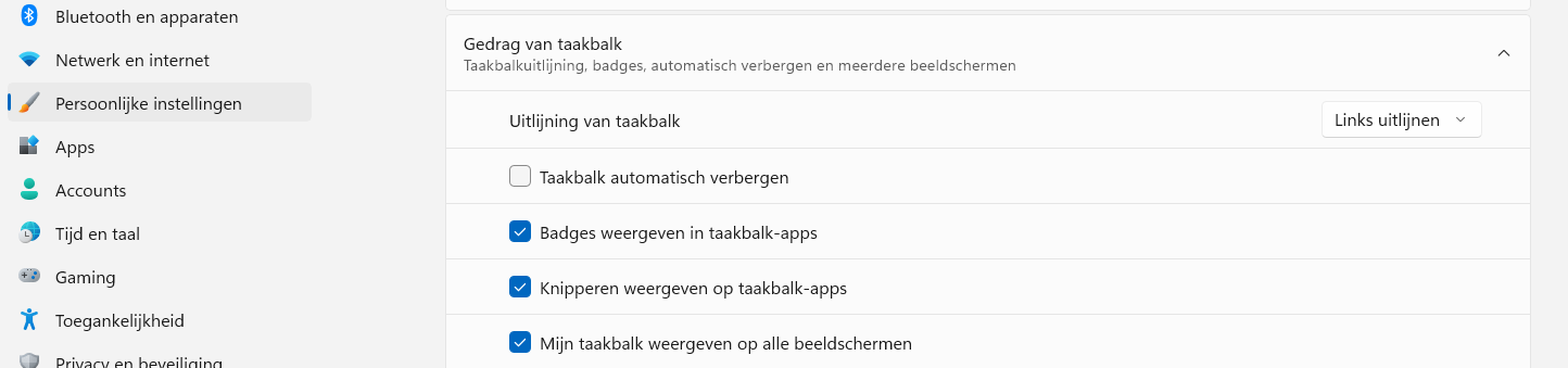 Windows 11 taakbalk links uitlijnen.